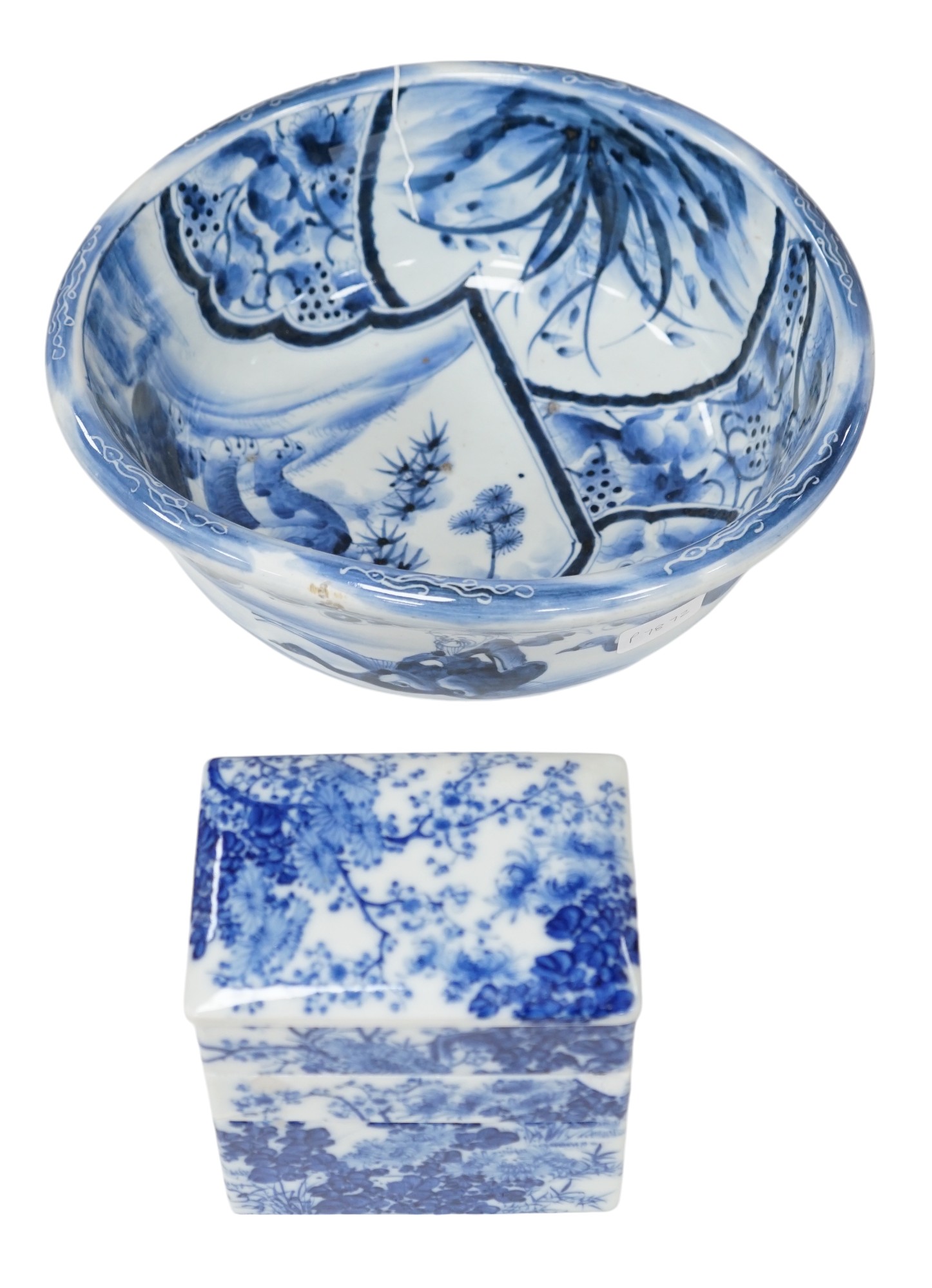 A Japanese blue and white Arita stacking box and bowl, 32cm diameter. Condition - bowl good, box poor